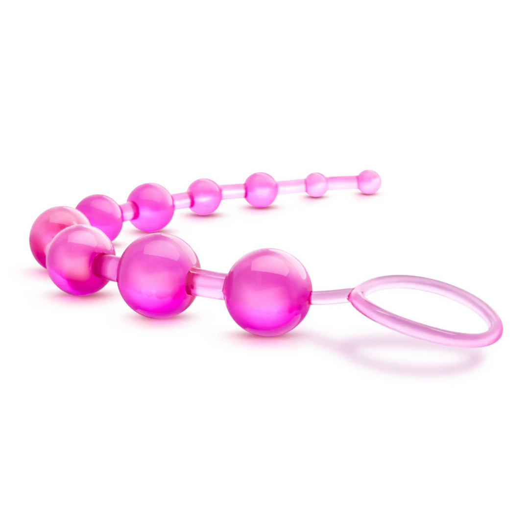 side view of pink sassy anal beads 