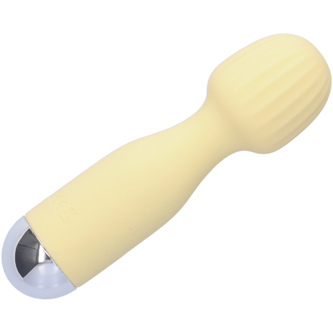 Image of Mini silicone rechargeable massage wand in the yellow color option.