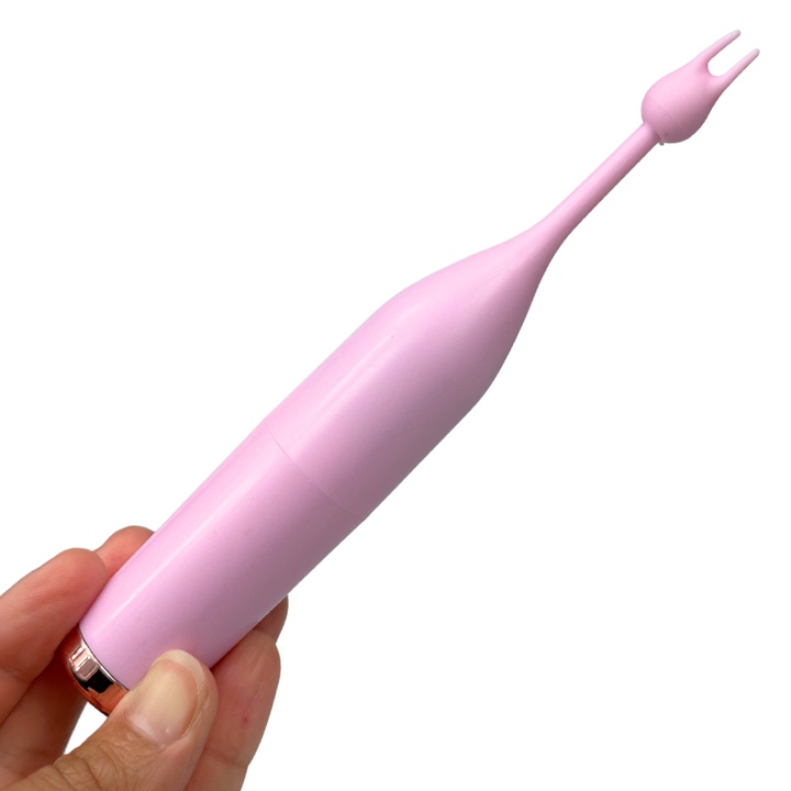 Powerful One Speed Pinpoint Vibrator image showing the on and off and one of the different tips included.