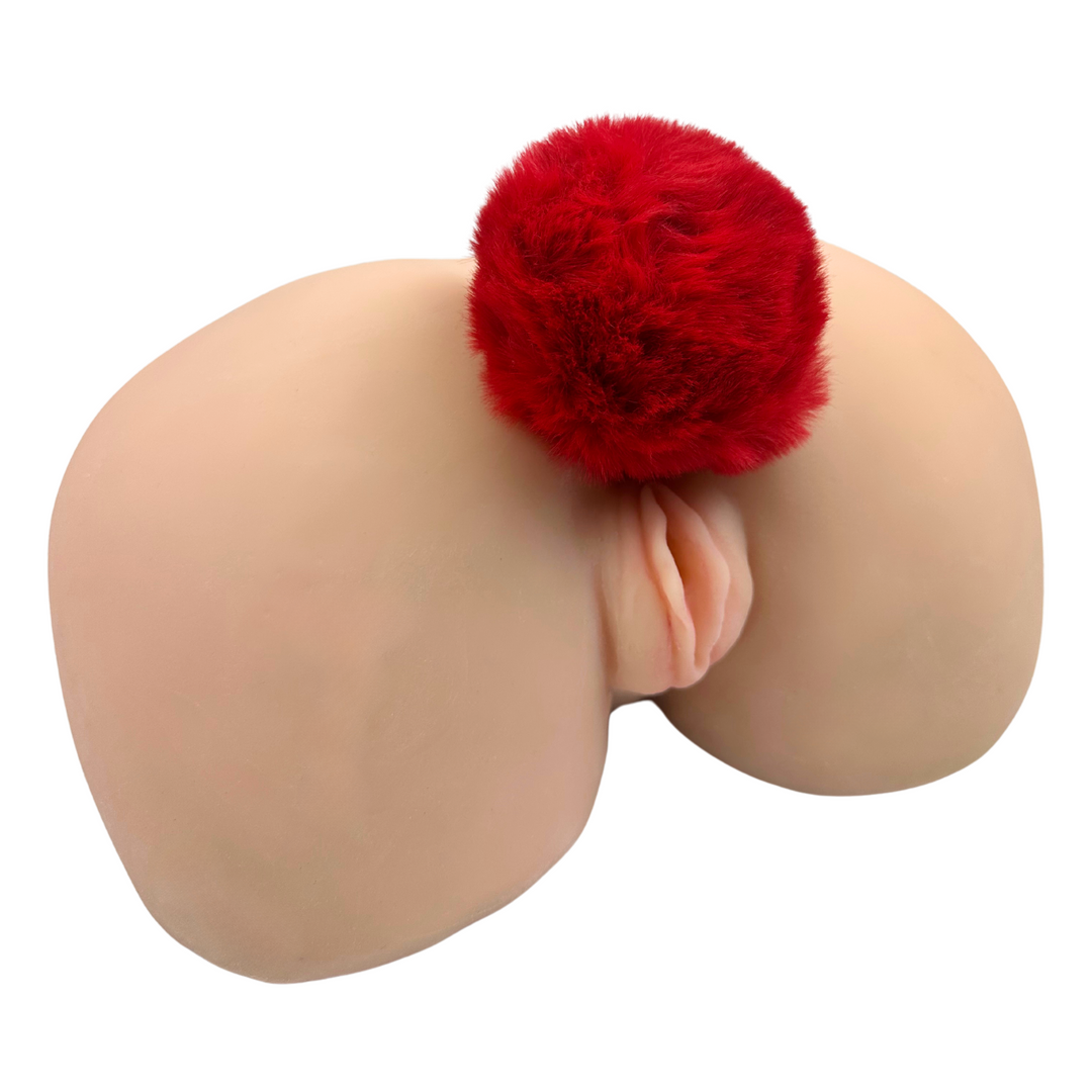 Red Sexy Bunny Tail Anal Plug shown inserted into a model of an anus