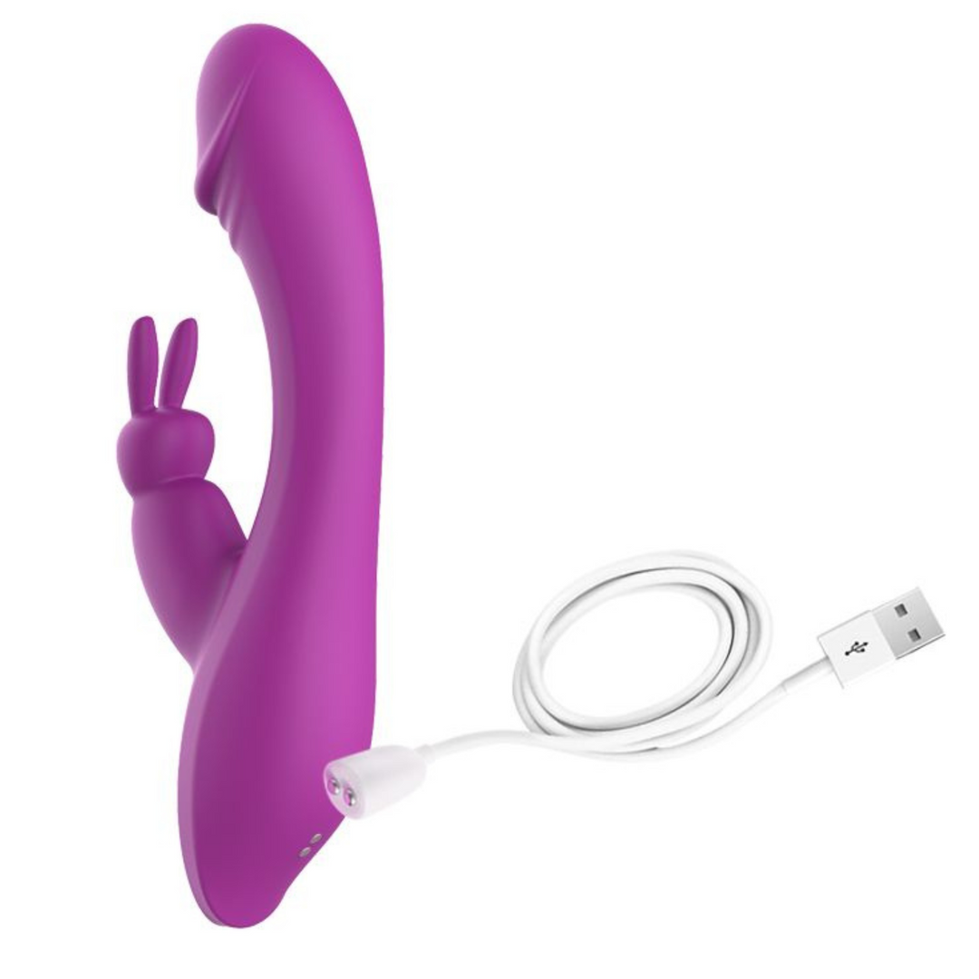 purple dual action rabbit vibrator with white charger