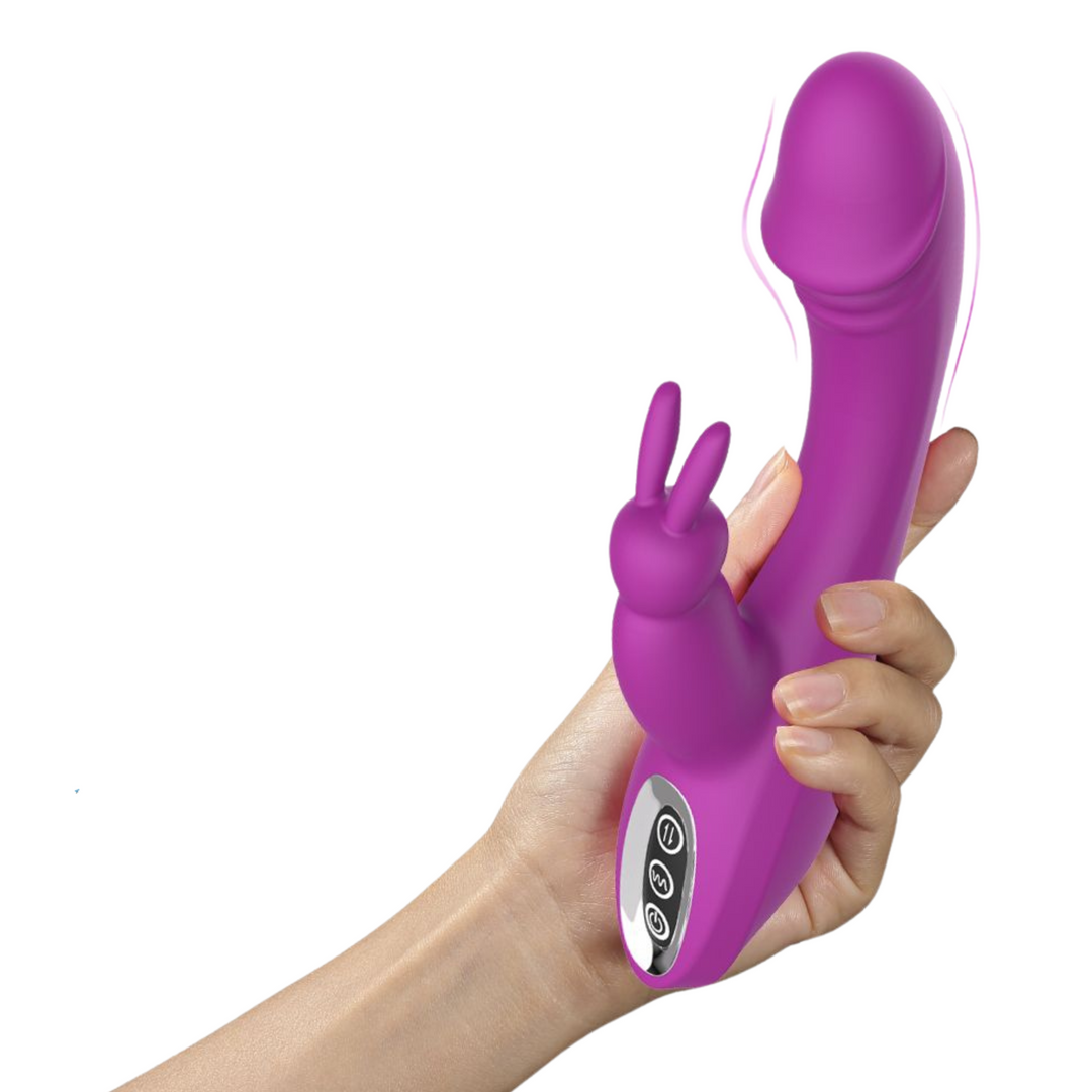 purple dual action rabbit vibrator in hand