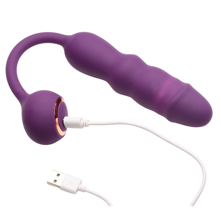 Inmi Thrust Thumper Rechargeable Silicone Vibrator with Remote Control view showing where the charger attaches to the product.