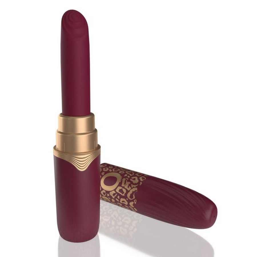 Red lipstick vibrator with cap off