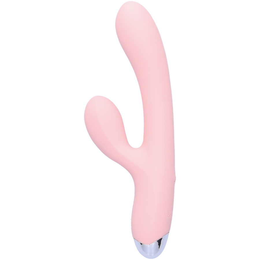 side view of pale pink dual action vibrator