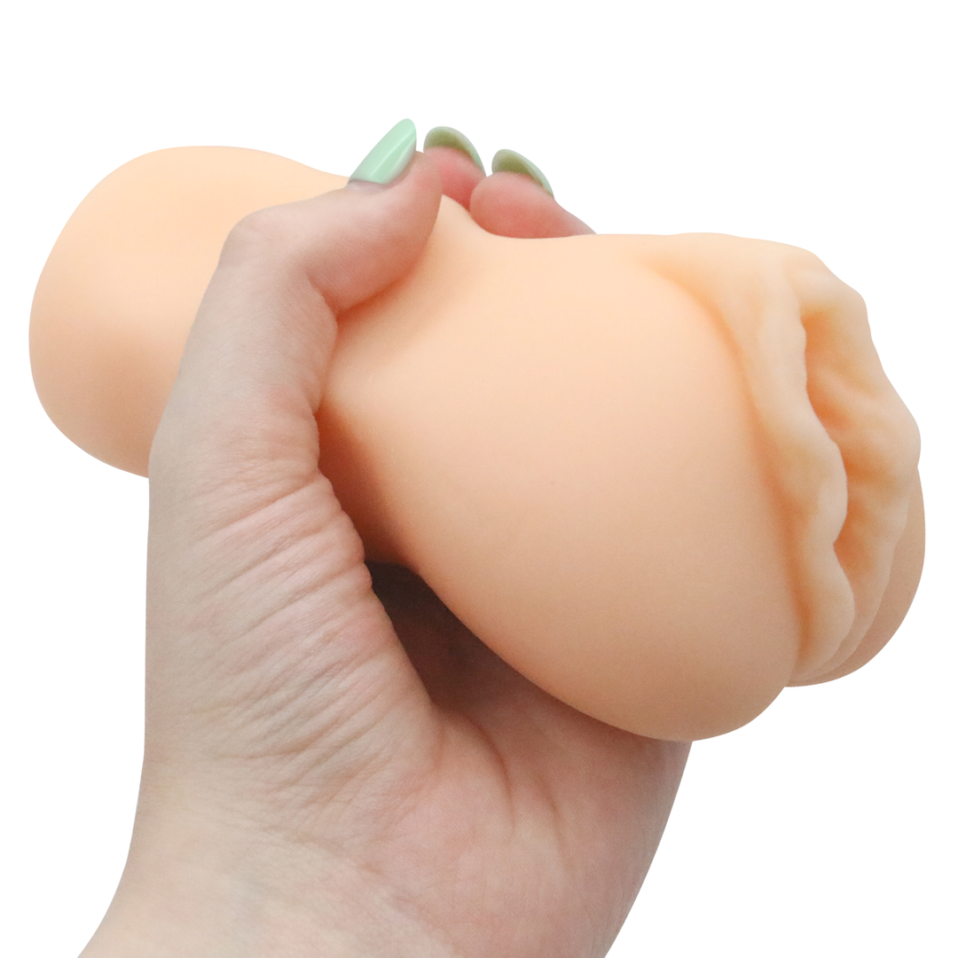 Image of the masturbator in hand. This compact toy will be sure to increase your pleasure and give you intense orgasms during masturbation! The realistic looking pussy and super soft material will make your next solo session super realistic!