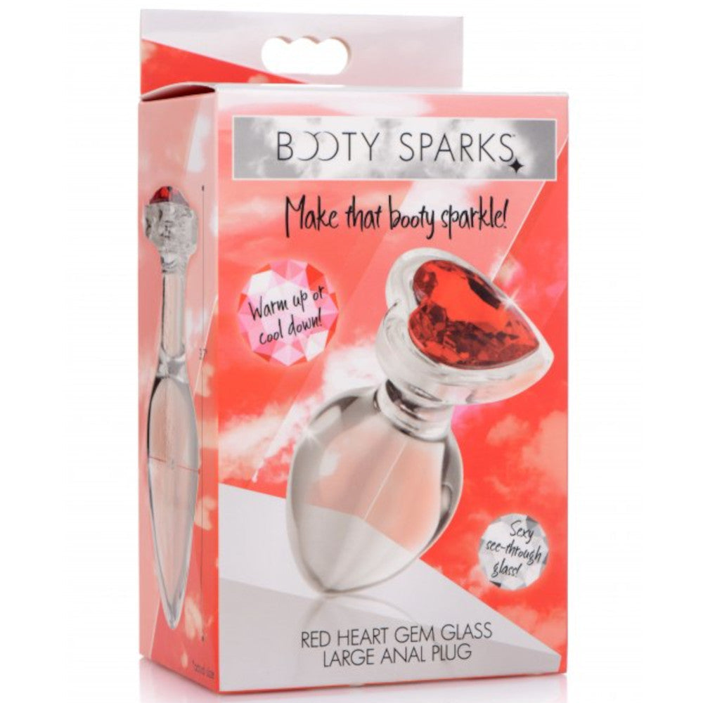 Image of the packaging for the Booty Sparks Red Heart Gem Glass Anal Plug. Text reads Booty Sparks, make that booty sparkle, warm up or cool down, sexy see-through glass, red heart gem glass large anal plug